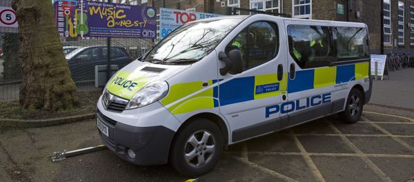 A police vehicle is pictured outside Bethnal Green Academy, where three missing British school girls attend, in east London, on February 23, 2015 - Sputnik International