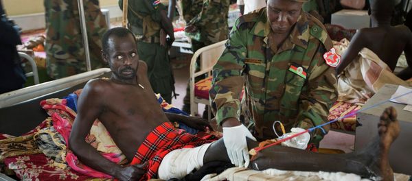 In this December 2013 file photo, a patient is treated by a military doctor in a ward at the Juba Military Hospital in Juba, South Sudan. - Sputnik International