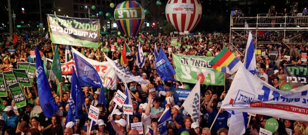Israelis take part in a rally Israelis take part in a rally - Sputnik International