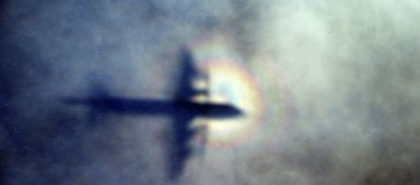 The shadow of a Royal New Zealand Air Force P3 Orion is seen on low level cloud while the aircraft searches for missing Malaysia Airlines Flight MH370 in the southern Indian Ocean, near the coast of Western Australia The shadow of a Royal New Zealand Air Force P3 Orion is seen on low level cloud while the aircraft searches for missing Malaysia Airlines Flight MH370 in the southern Indian Ocean, near the coast of Western Australia - Sputnik International