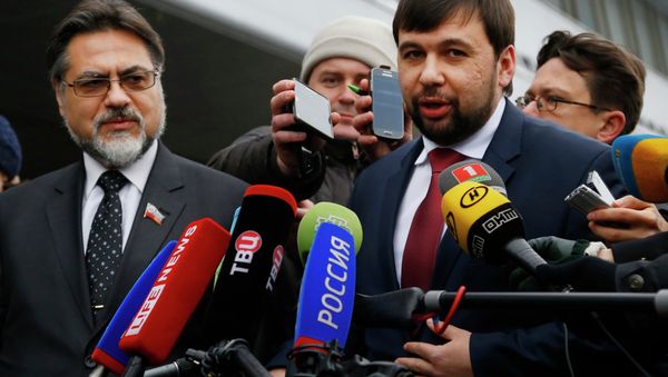 Representatives of the Donetsk and Lugansk People's Republics Denis Pushilin, right, and Vladislav Deinego Representatives of the Donetsk and Lugansk People's Republics Denis Pushilin, right, and Vladislav Deinego - Sputnik International