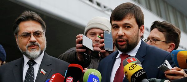 Representatives of the Donetsk and Lugansk People's Republics Denis Pushilin, right, and Vladislav Deinego - Sputnik International