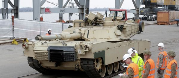 An Abrams main battle tank, for U.S. troops deployed in the Baltics as part of NATO's Operation Atlantic Resolve, leaves Riga port March 9, 2015. - Sputnik International