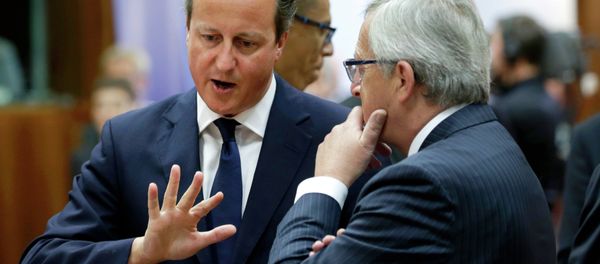 British Prime Minister David Cameron, left, speaks with European Commission President Jean-Claude Juncker at an EU summit in Brussels, in 2014. British Prime Minister David Cameron, left, speaks with European Commission President Jean-Claude Juncker at an EU summit in Brussels, in 2014. - Sputnik International