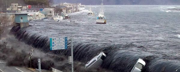This picture taken by a Miyako City official on March 11, 2011 and released on March 18, 2011 shows a tsunami breeching an embankment and flowing into the city of Miyako in Iwate prefecture shortly after a 9.0 magnitude earthquake hit the region of northern Japan This picture taken by a Miyako City official on March 11, 2011 and released on March 18, 2011 shows a tsunami breeching an embankment and flowing into the city of Miyako in Iwate prefecture shortly after a 9.0 magnitude earthquake hit the region of northern Japan - Sputnik International