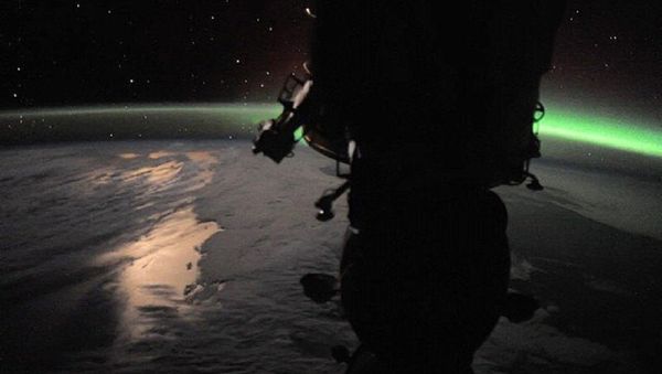 The Soyuz spacecraft against the background of our beautiful planet - Sputnik International