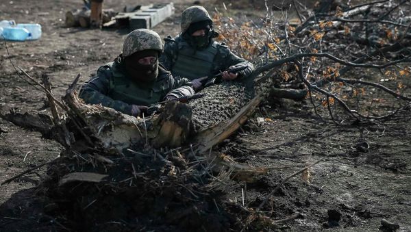 Members of the Ukrainian armed forces take their positions near Kurakhovo, not far from Donetsk March 11, 2015 Members of the Ukrainian armed forces take their positions near Kurakhovo, not far from Donetsk March 11, 2015 - Sputnik International