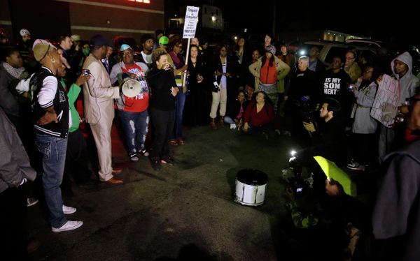Protesters gather across the street from the Ferguson Police Department, Thursday, March 12, 2015, in Ferguson, Mo - Sputnik International