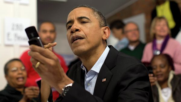 President Barack Obama visits a campaign office, Monday, Nov. 5, 2012, in the German Village section of Columbus, Ohio, to greet and make phone calls to volunteers President Barack Obama visits a campaign office, Monday, Nov. 5, 2012, in the German Village section of Columbus, Ohio, to greet and make phone calls to volunteers - Sputnik International