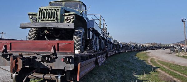 Military machinery prepared for shipment to Ukraine Military machinery prepared for shipment to Ukraine - Sputnik International