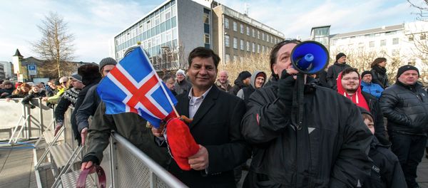 Thousands of protesters gather in front of teh Parliament in the Icelandic capital Reykjavik on February 24, 2014 - Sputnik International