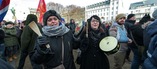 Thousands of protesters gather in front of teh Parliament in the Icelandic capital Reykjavik on February 24, 2014 - Sputnik International