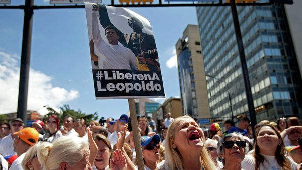 Supporters of jailed opposition leader Leopoldo Lopez chant slogans demanding his freedom and at an event marking the one year anniversary of his arrest and imprisonment in Caracas, Venezuela, Wednesday, Feb. 18, 2015 Supporters of jailed opposition leader Leopoldo Lopez chant slogans demanding his freedom and at an event marking the one year anniversary of his arrest and imprisonment in Caracas, Venezuela, Wednesday, Feb. 18, 2015 - Sputnik International