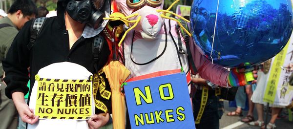 Demonstrators wearing costumes take part in an anti-nuclear protest in Taipei March 14, 2015 - Sputnik International