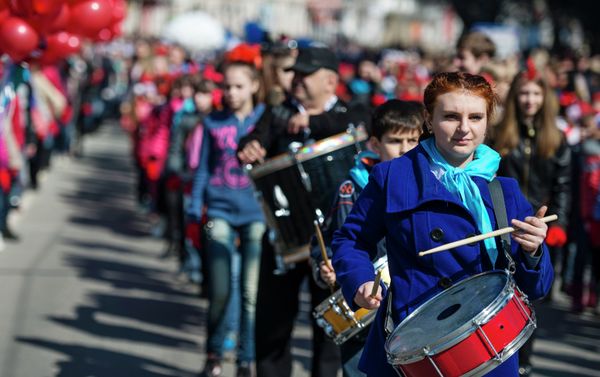 Participants of the Crimean Spring anniversary celebrations march through downtown Simferopol - Sputnik International