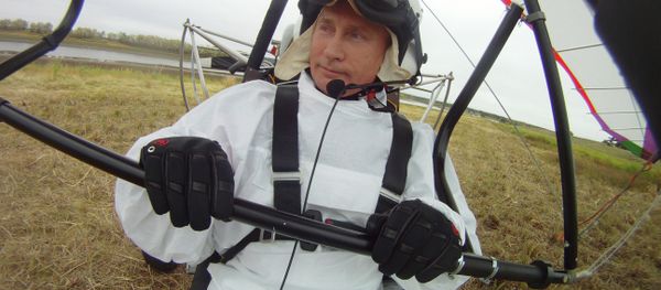 Russian President Vladimir Putin (right) takes part in a scientific experiment as part of the Flight of Hope Russian President Vladimir Putin (right) takes part in a scientific experiment as part of the Flight of Hope - Sputnik International