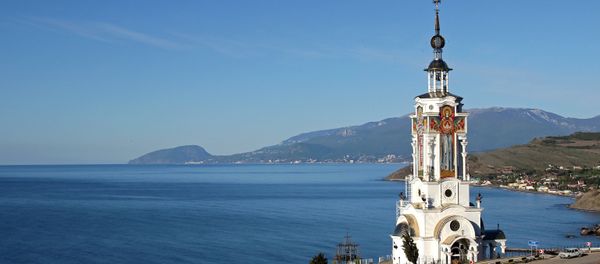 View of the St. Nicholas the Wonder Worker church/light house in the village of Malorechenskoye in the Crimea's Sudak District. - Sputnik International