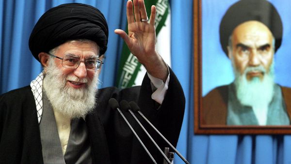 Iranian supreme leader Ayatollah Ali Khamenei waves to the worshippers. Iranian supreme leader Ayatollah Ali Khamenei waves to the worshippers. - Sputnik International