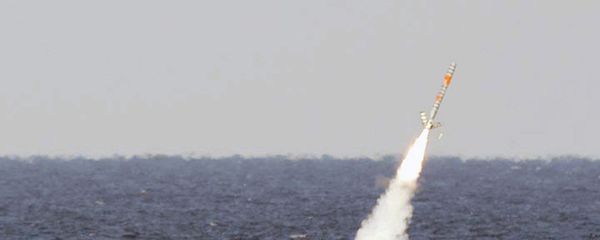 A Tomahawk cruise missile is seen emerging from the ocean after being launched from the USS Florida. A Tomahawk cruise missile is seen emerging from the ocean after being launched from the USS Florida. - Sputnik International