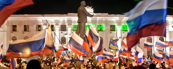 Pro-Russian people celebrate in Lenin Square, in Simferopol, Ukraine, Sunday, March 16, 2014. - Sputnik International
