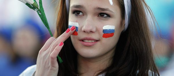 A girl with Russian national flags painted on her cheeks takes part in celebrations marking the one-year anniversary of Crimea voting to leave Ukraine, in central Simferopol March 16, 2015. A girl with Russian national flags painted on her cheeks takes part in celebrations marking the one-year anniversary of Crimea voting to leave Ukraine, in central Simferopol March 16, 2015. - Sputnik International