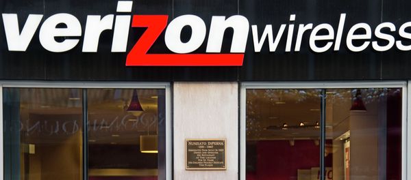 A woman on her cell phone walks past a Verizon Wireless store in Washington A woman on her cell phone walks past a Verizon Wireless store in Washington - Sputnik International