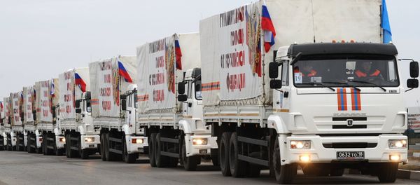 The trucks from the next column of Emercom of Russia with humanitarian aid for inhabitants of Donbass on the Matveev Kurgan check point in the Rostov region - Sputnik International