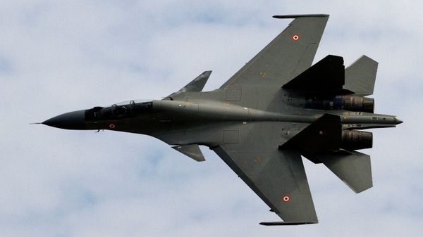 Indian Air Force (IAF) Sukhoi Su-30 fighter aircraft flies past during a parade at an airbase in Tezpur, India, Friday, Nov. 21 2014 - Sputnik International