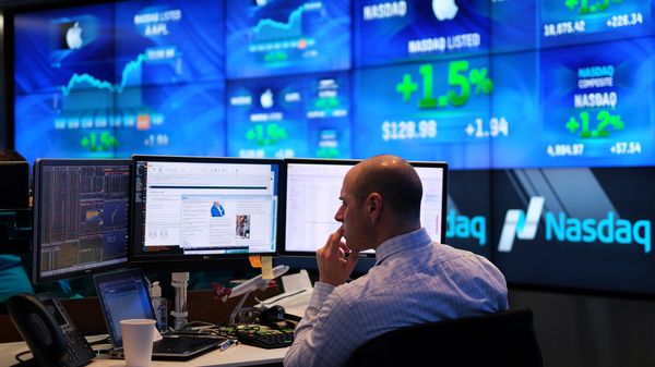 A trader works at the Nasdaq MarketSite in New York A trader works at the Nasdaq MarketSite in New York - Sputnik International