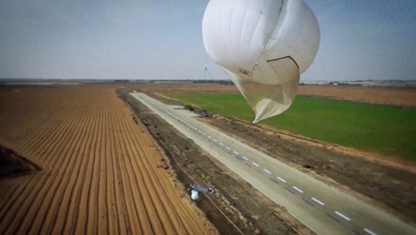 Skystar 180 aerostat system flies over land - Sputnik International
