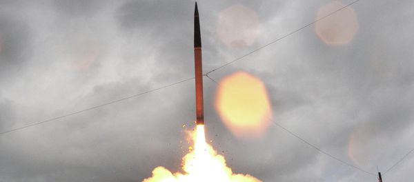 Lockheed Martin shows the Terminal High Altitude Area Defense system, or THAAD missile being launched from a mobile launcher at Kauai's Pacific Missile Range Facility - Sputnik International