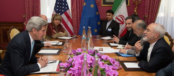 U.S. Secretary of State John Kerry holds a meeting with Iran's Foreign Minister Mohammad Javad Zarif over Iran's nuclear program, in Lausanne, Switzerland, Wednesday March 18. - Sputnik International