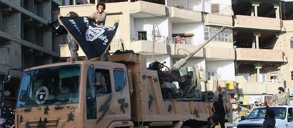 Fighters from the al-Qaida linked Islamic State of Iraq and the Levant (ISIL) during a parade in Raqqa, Syria - Sputnik International