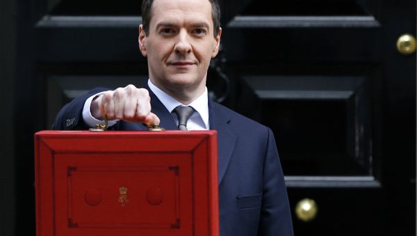 Britain's Chancellor George Osborne poses for the media with the traditional red dispatch box outside his official residence at 11 Downing Street in London Britain's Chancellor George Osborne poses for the media with the traditional red dispatch box outside his official residence at 11 Downing Street in London - Sputnik International