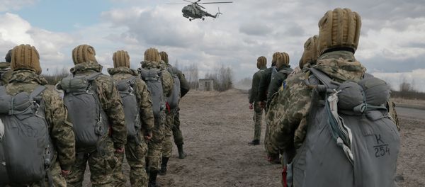 Ukrainian army soldiers perform a military exercise at a training ground outside Zhitomir, Ukraine Ukrainian army soldiers perform a military exercise at a training ground outside Zhitomir, Ukraine - Sputnik International