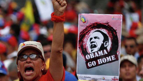 A supporter of Venezuela's President Nicolas Maduro shouts next to a placard depicting US President Barack Obama during a rally against imperialism, in Caracas March 15, 2015 A supporter of Venezuela's President Nicolas Maduro shouts next to a placard depicting US President Barack Obama during a rally against imperialism, in Caracas March 15, 2015 - Sputnik International
