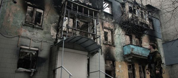 An apartment building in Debaltsevo destroyed by shelling An apartment building in Debaltsevo destroyed by shelling - Sputnik International