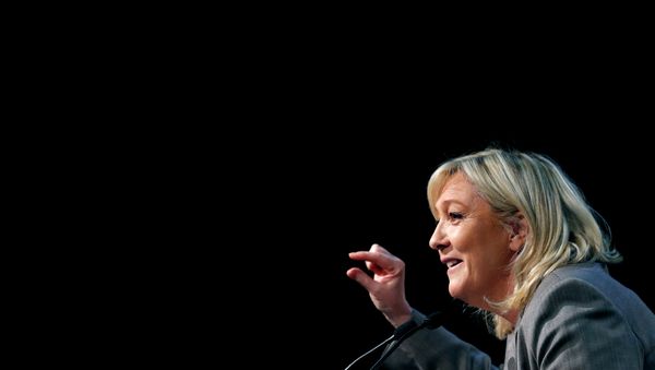 France's far-right National Front political party leader Marine Le Pen delivers a speech during a political rally in Six-Fours, near Toulon South Eastern France, March 16, 2015 France's far-right National Front political party leader Marine Le Pen delivers a speech during a political rally in Six-Fours, near Toulon South Eastern France, March 16, 2015 - Sputnik International