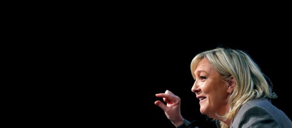 France's far-right National Front political party leader Marine Le Pen delivers a speech during a political rally in Six-Fours, near Toulon South Eastern France, March 16, 2015 France's far-right National Front political party leader Marine Le Pen delivers a speech during a political rally in Six-Fours, near Toulon South Eastern France, March 16, 2015 - Sputnik International