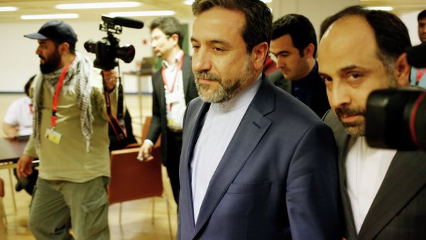 Abbas Araghchi (C), Iran's chief nuclear negotiator arrives at the Austria Center Vienna after another rounds of talks between the EU 5+1 on May 16, 2014 in Vienna Abbas Araghchi (C), Iran's chief nuclear negotiator arrives at the Austria Center Vienna after another rounds of talks between the EU 5+1 on May 16, 2014 in Vienna - Sputnik International