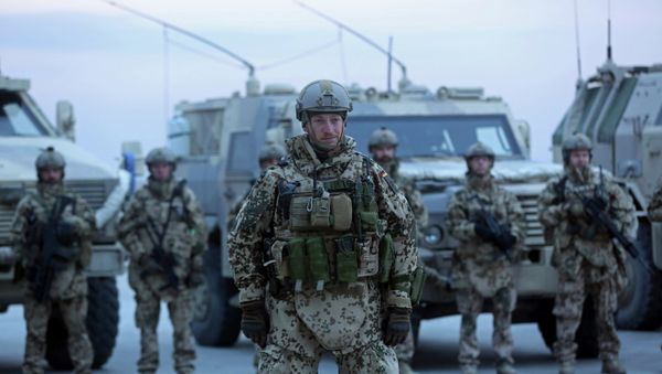 German soldiers stand guard during the NATO Secretary-General Jens Stoltenberg's first visit German soldiers stand guard during the NATO Secretary-General Jens Stoltenberg's first visit - Sputnik International