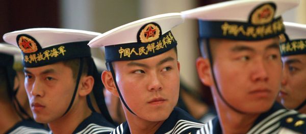 A military honor guard prepares for US Chief of Naval Operations Admiral Jonathan Greenert's visit with Commander in Chief of the PLA Navy Adm. Wu Shengli at a welcoming ceremony at the PLA Navy headquarters outside Beijing, China - Sputnik International