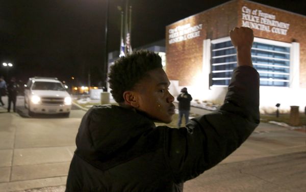 Clifton Kinnie joins protesters as they block traffic on the street outside the Ferguson, Mo. Clifton Kinnie joins protesters as they block traffic on the street outside the Ferguson, Mo. - Sputnik International