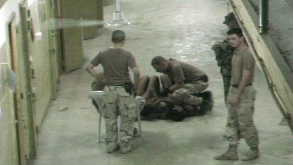 The United States government must release more photos that document abuses of detainees while in US custody at the Abu Ghraib prison in Iraq as well as other sites, according to the ruling of a federal court on Friday. - Sputnik International