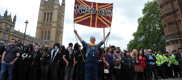 Unite Against Fascism (UAF) supporters protest during a demonstration against the British National Party (BNP) in central London. File photo Unite Against Fascism (UAF) supporters protest during a demonstration against the British National Party (BNP) in central London. File photo - Sputnik International