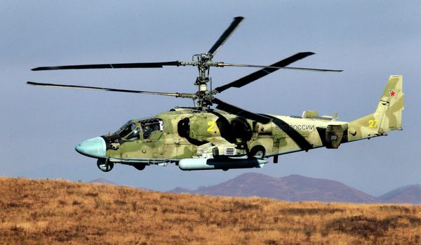 The Ka-52 Alligator attack helicopter, seen here supporting a landing party during exercises of the Russian Pacific Fleet - Sputnik International