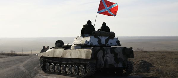 Withdrawing a column of 2S1 Gvozdika howitzers from the village of Obilnoye in pursuance of the Minsk agreements Withdrawing a column of 2S1 Gvozdika howitzers from the village of Obilnoye in pursuance of the Minsk agreements - Sputnik International