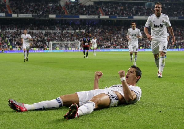 Real Madrid's Cristiano Ronaldo from Portugal celebrates after scoring against Racing Santander during a Spanish La Liga soccer match at the Santiago Bernabeu stadium in Madrid - Sputnik International