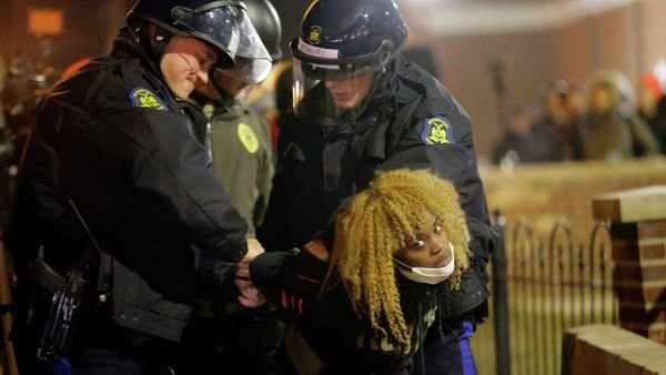 Police officers take a protester into custody Tuesday, Nov. 25, 2014, in Ferguson, Mo. Police officers take a protester into custody Tuesday, Nov. 25, 2014, in Ferguson, Mo. - Sputnik International