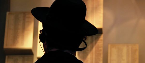 An Ultra-Orthodox Jewish man looks at facsimiles of Oskar Schindler's lists displayed for the public at the Yad Vashem Holocaust memorial museum in Jerusalem - Sputnik International